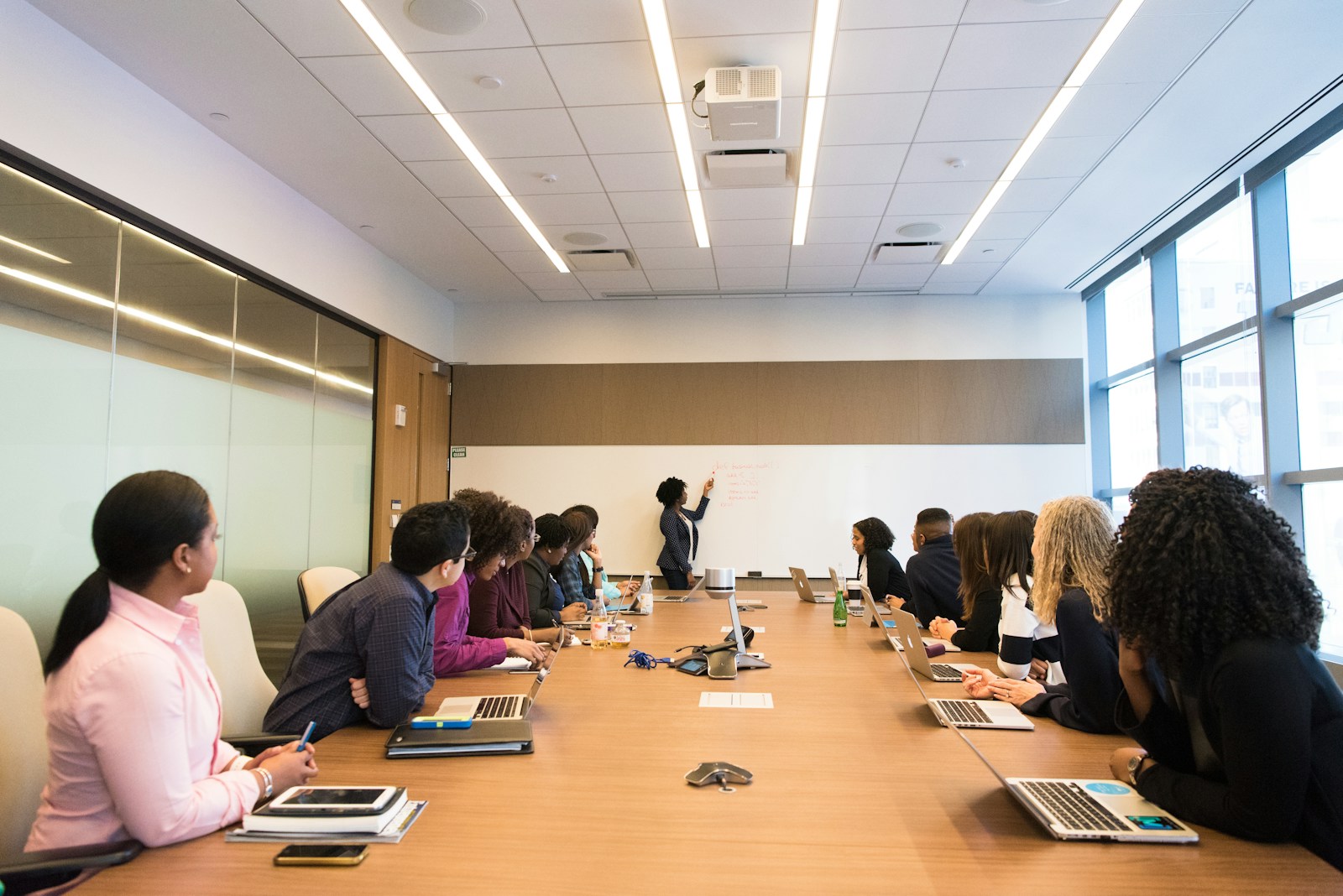Senior management discussion in a boardroom meeting