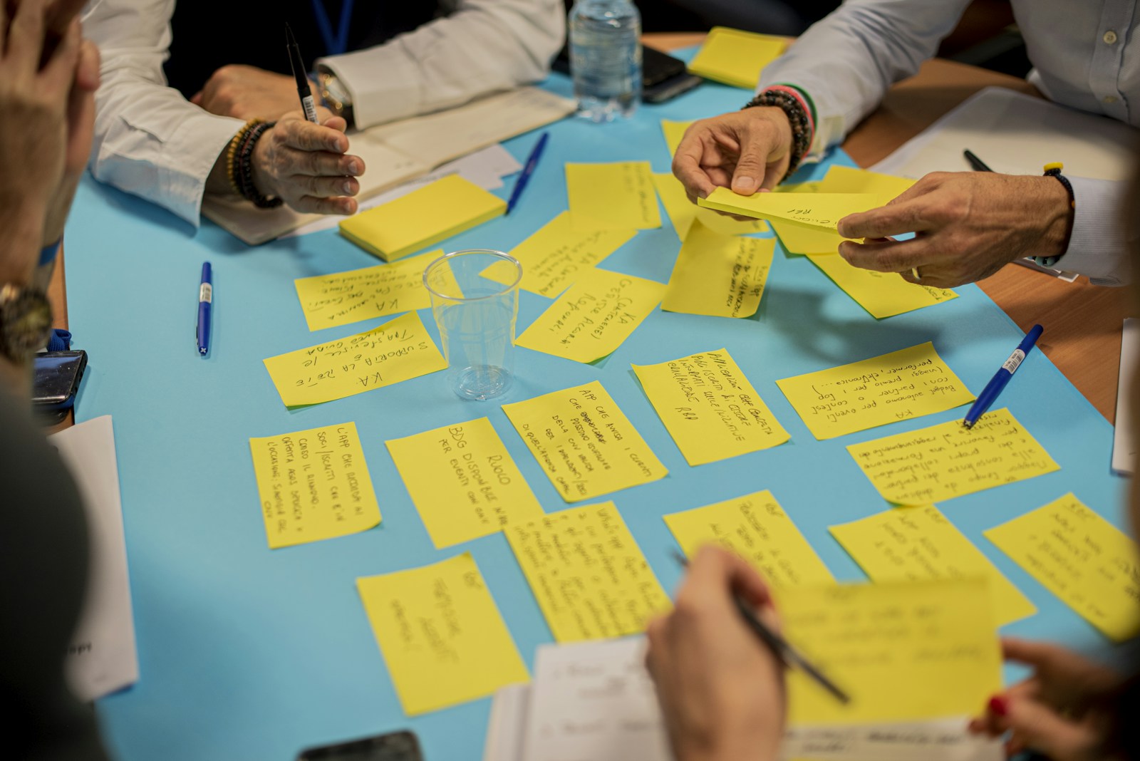 Employees taking part in a feedback workshop in an office