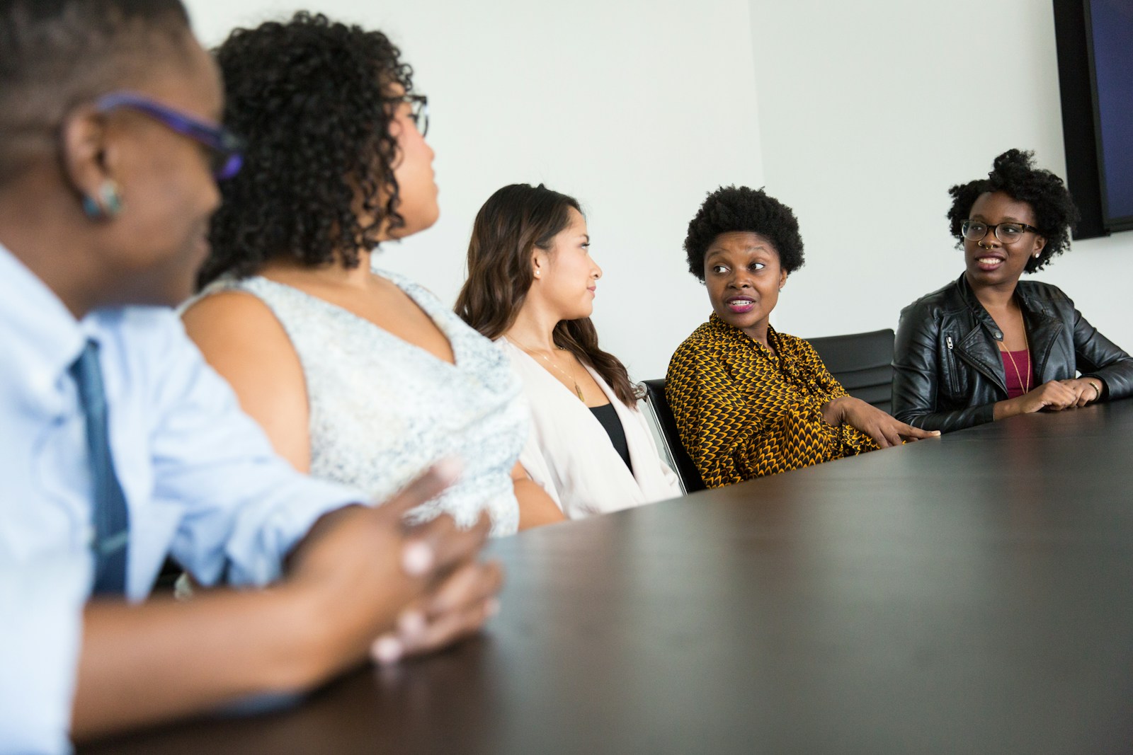 Diverse team taking part in workplace training and discussion