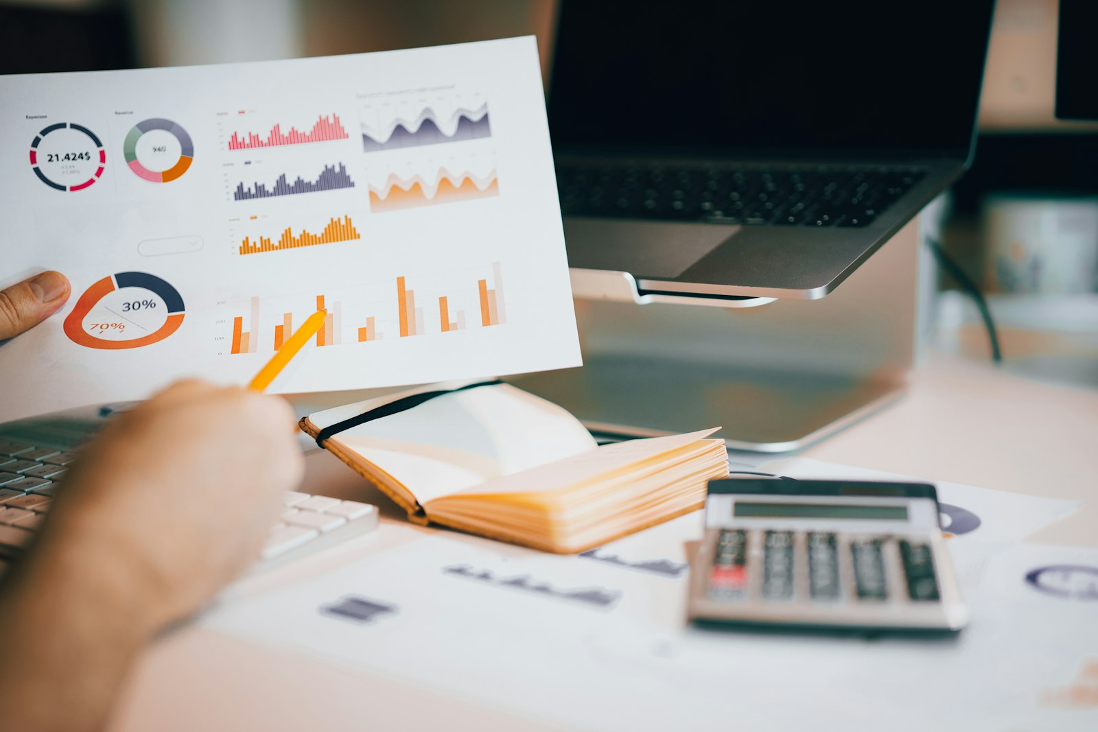 Sustainable Finance and ESG Due Diligence | Land Sterling Analyst reviewing a transaction information list